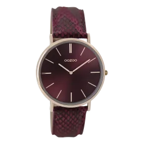 Rose gold coloured  watch with burgundy leather strap